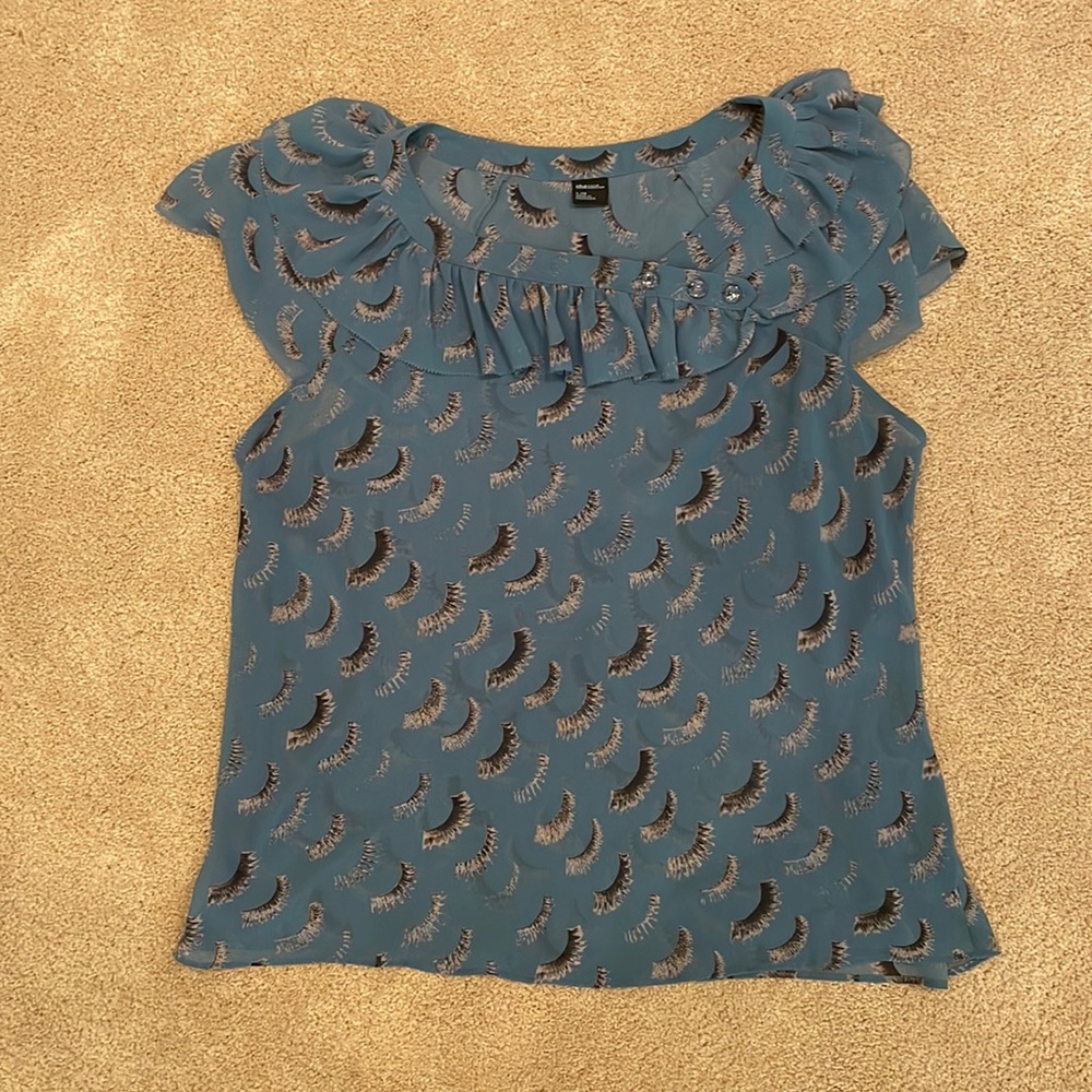 Blue blouse with eyelashes, cute ruffled neckline